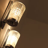 Wall lamps in worked glass and chromed metal, Italy 70's