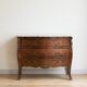 Curved Regency-style commode in mahogany marquetry.