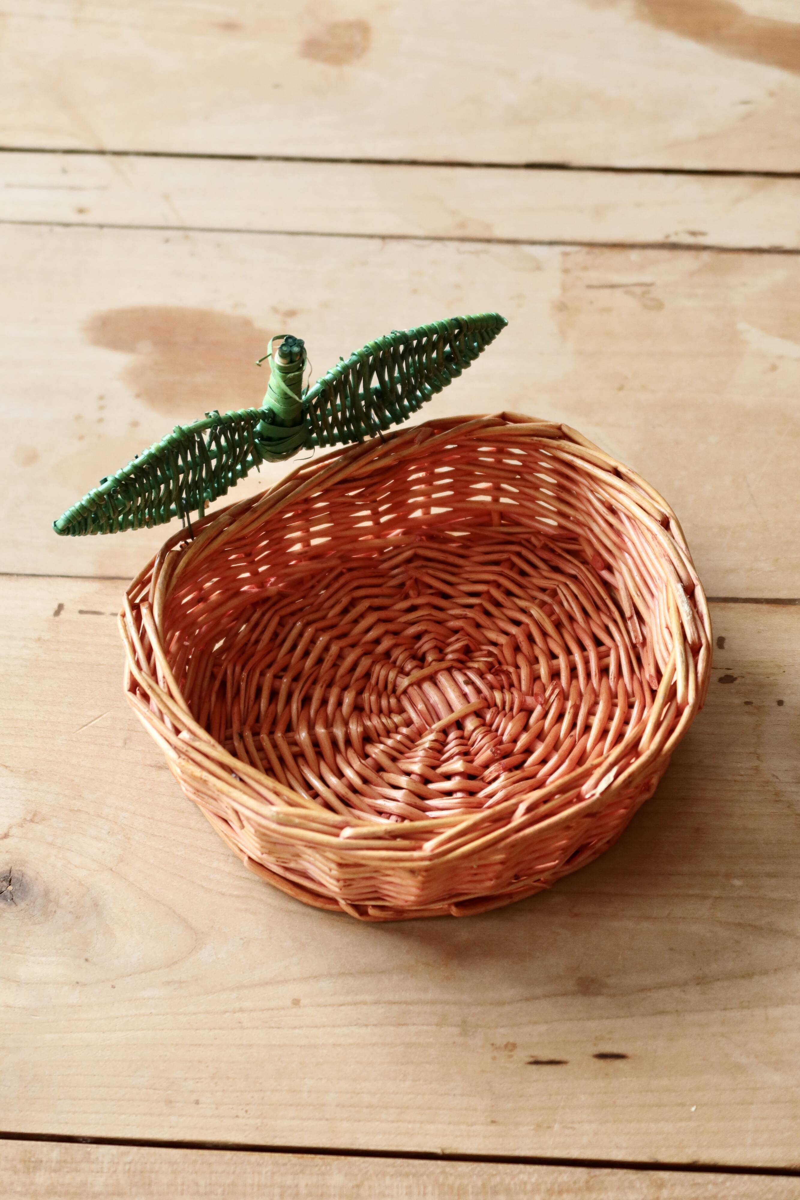 Small vintage wicker baskets in the shape of orange and lemon fruit