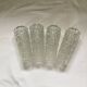 Lot de quatre tulipes en verre pressé vintage dimension : hauteur -20cm- diamètre -5,5cm-