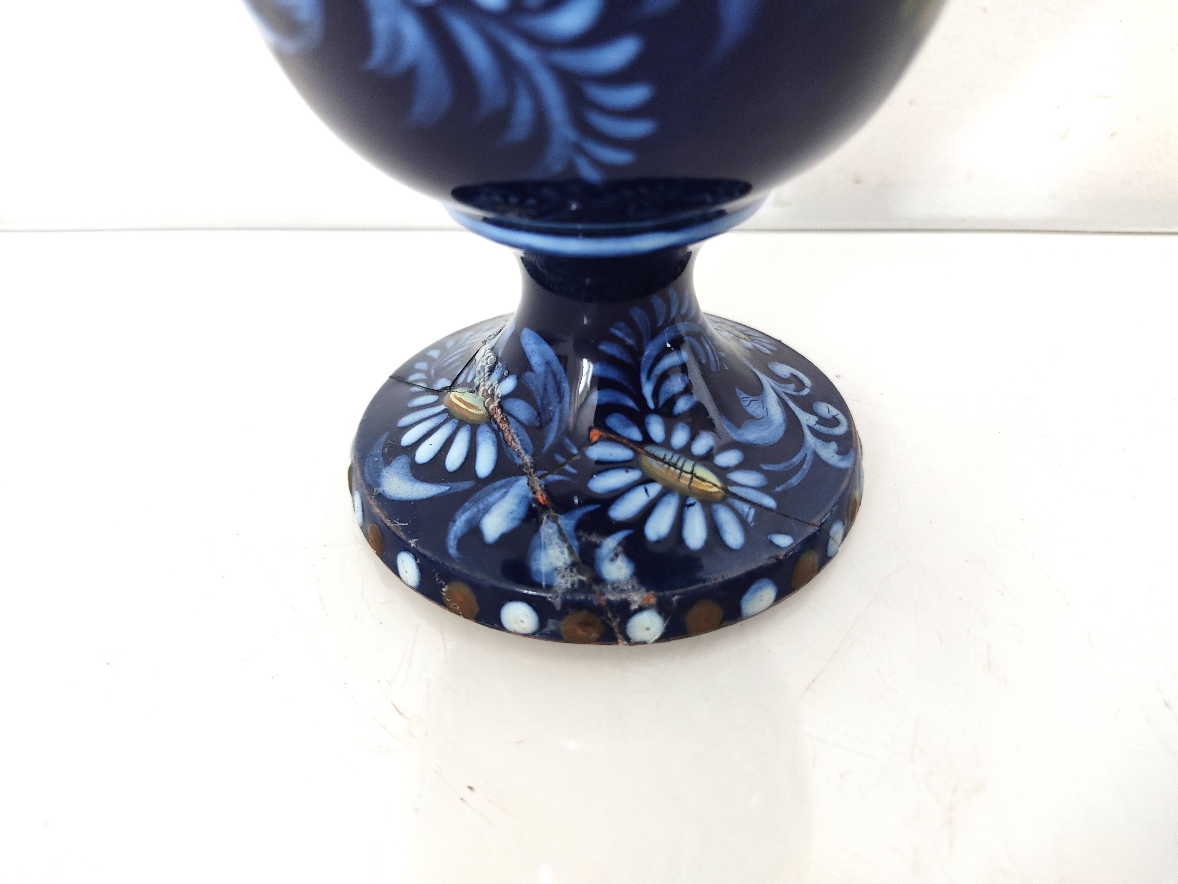 Small blue vase with birds