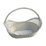 White wicker cradle basket
