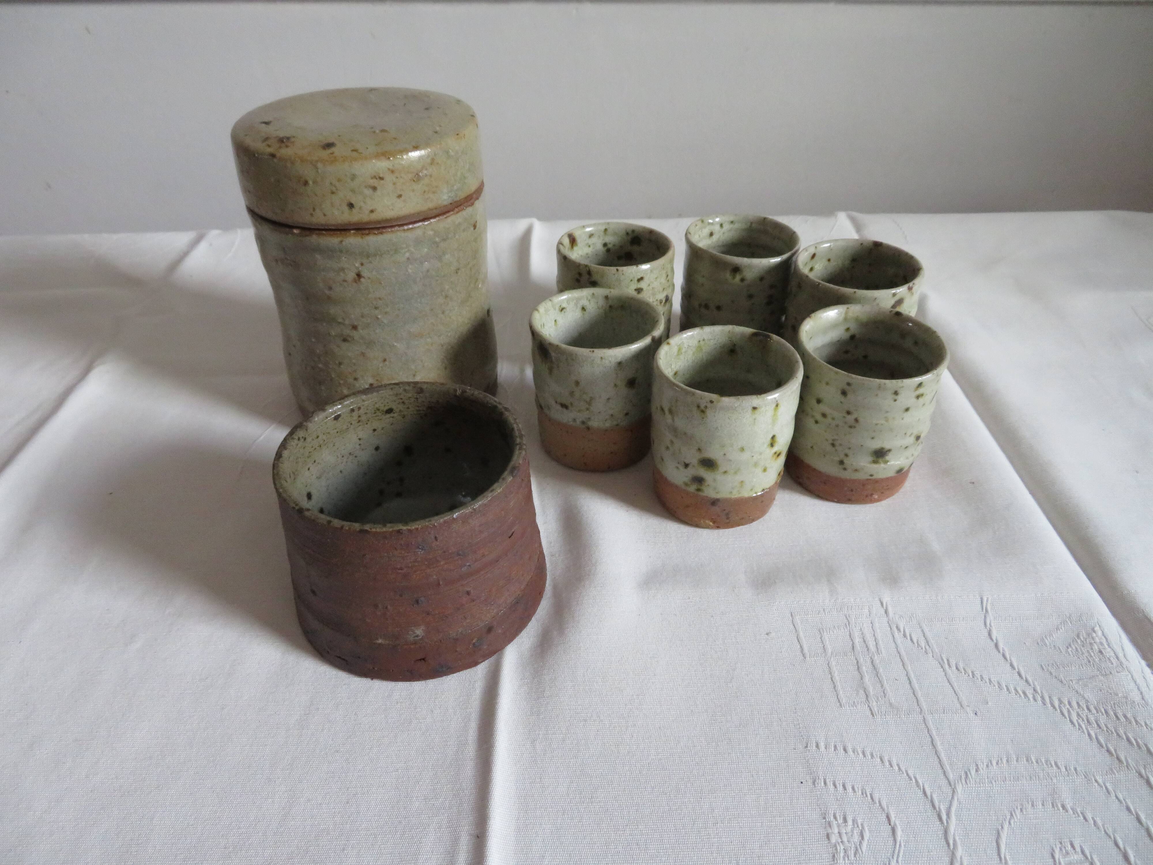 6 coffee glasses, sugar and cookie jar