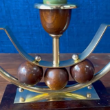 Pair of Art Deco candlesticks in brass and varnished wood, 1930s/1940s