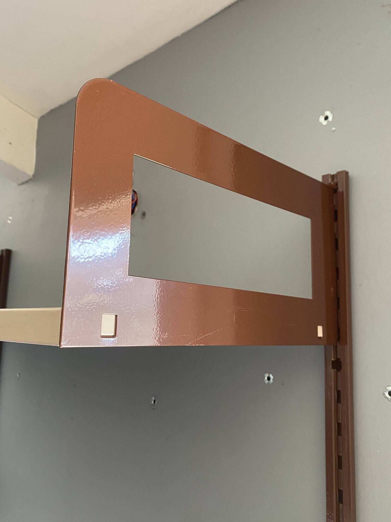 Modular metal wall shelf in brown and beige vintage 70s design.