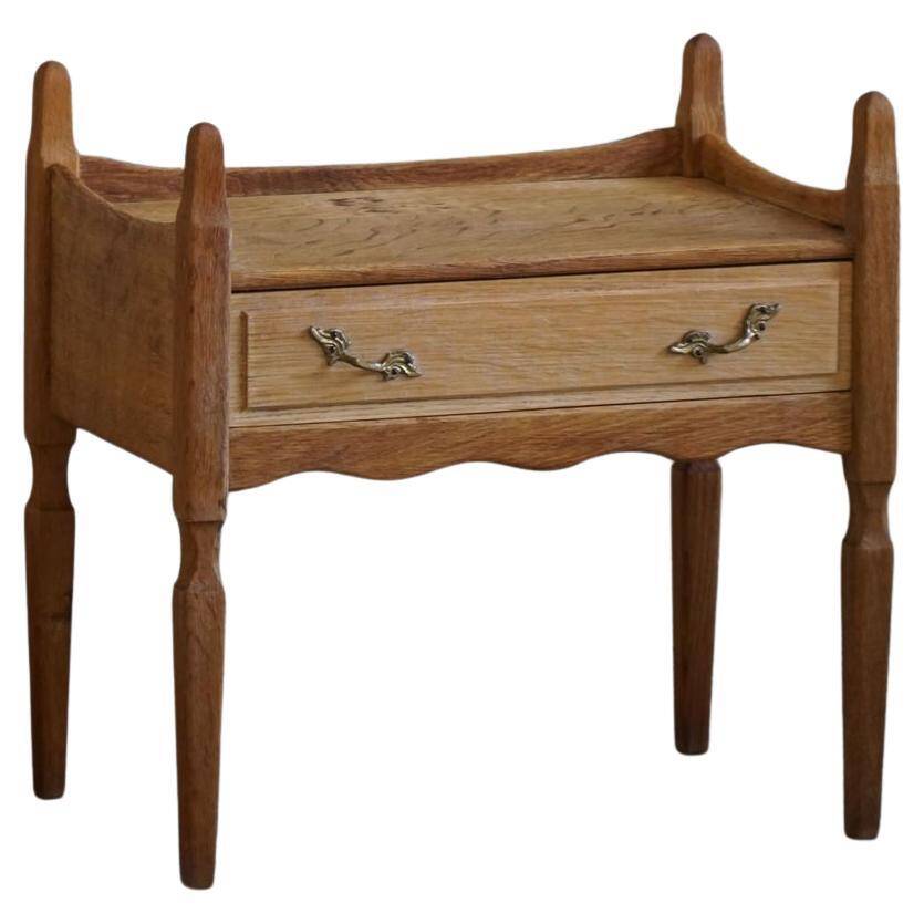 Henning Kjærnulf, oak bedside table, modern Danish, "Razorblade", 1960s