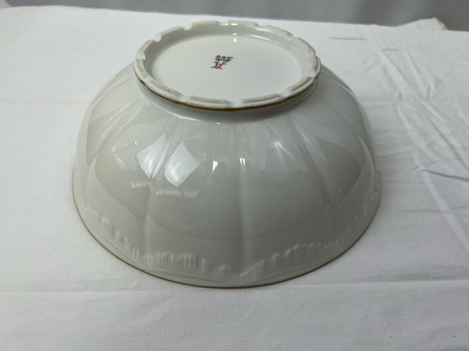 White and golden salad bowl