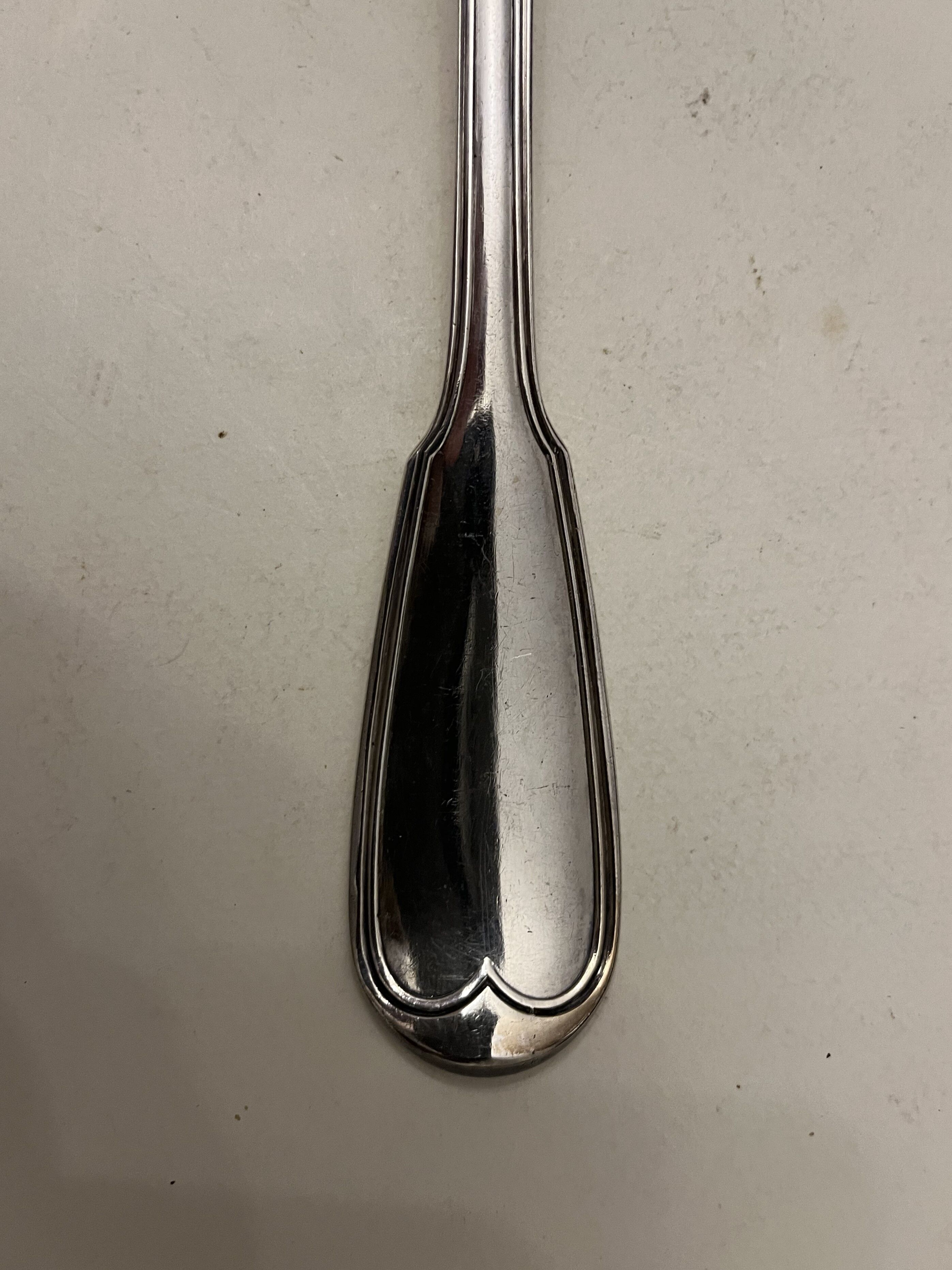 Silver metal ladle