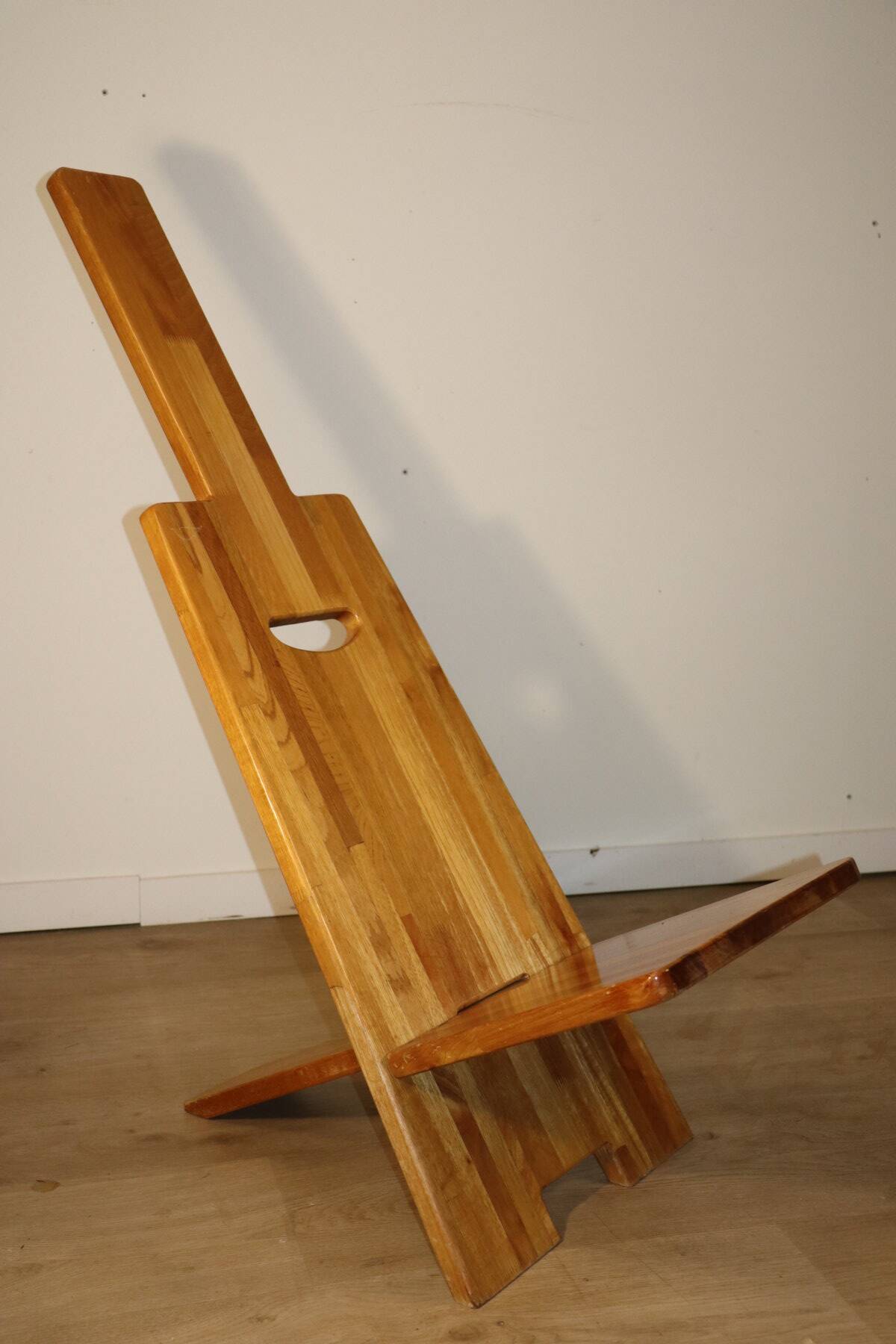 Sculptural brutalist armchair in solid elm, 1980.