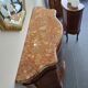 Curved support furniture in floral marquetry – Louis XV style, marble top, late 19th century.