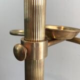 Neoclassical style valet stand in brass and black lacquered wood. French work. Circa 1940