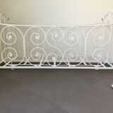 White wrought iron folding bed