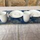 Duo of cups and under cups with white porcelain coffee S-P