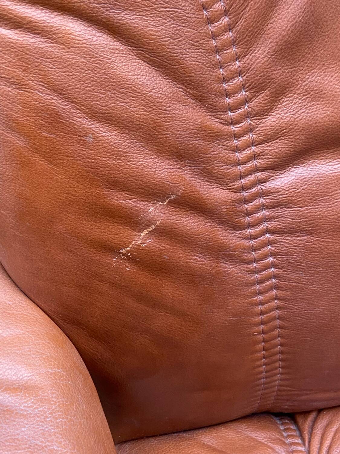 Stressless armchair and footrest set from the 70s/80s.