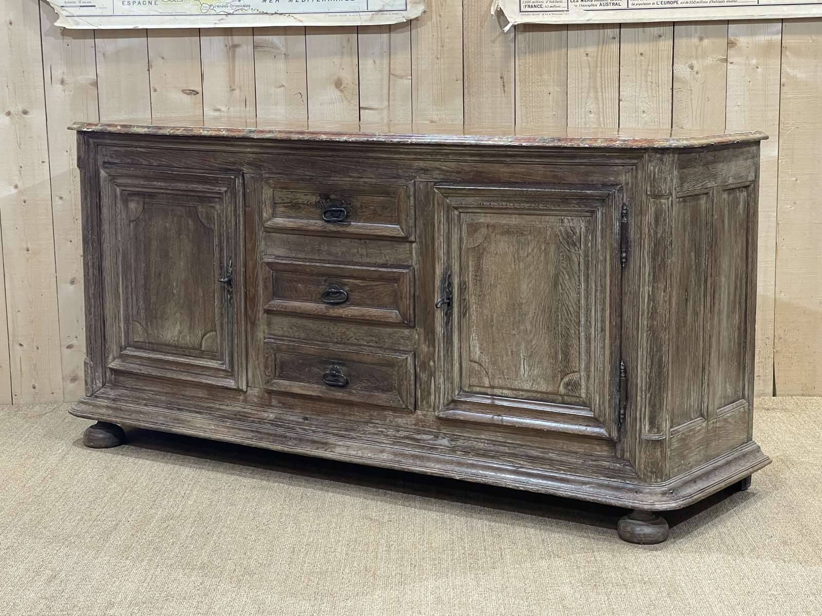 18th-century oak enfilade with a marble-effect painted top.