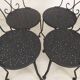 4 black garden chairs
