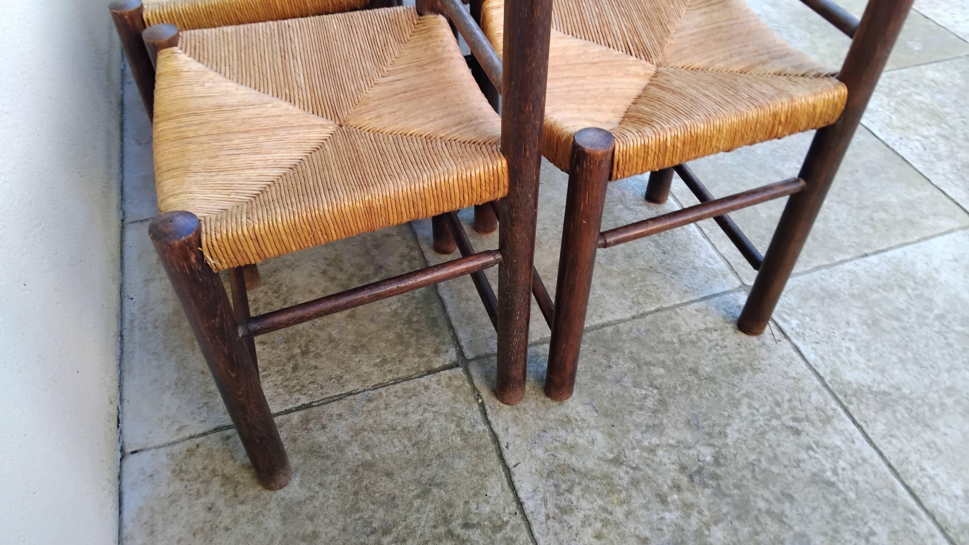 8 vintage straw chairs from the 1950s.