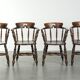 Set of four wooden English antique pub/captain chairs from the 19th century