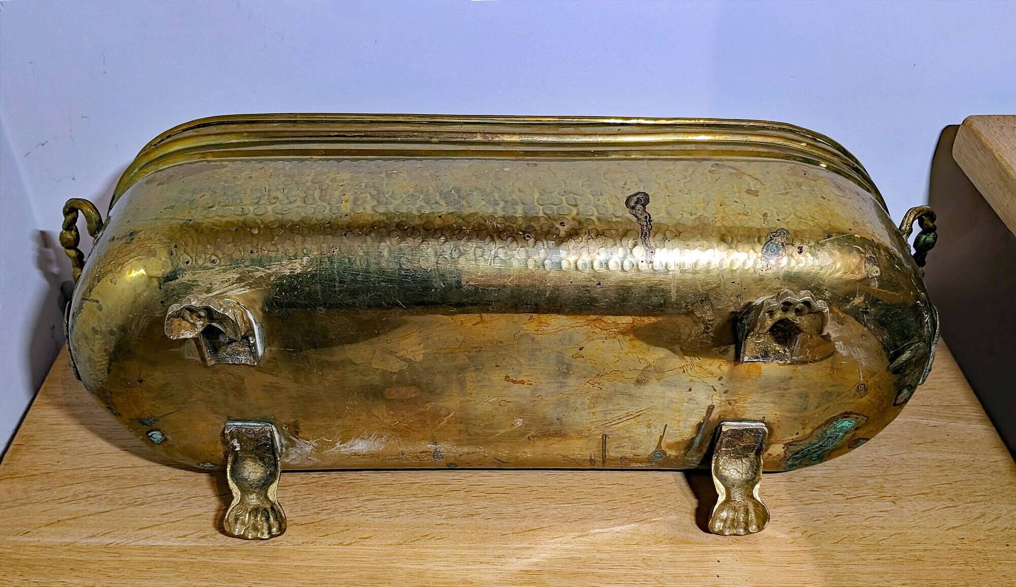 Pair of large antique planters with lion's paw feet.