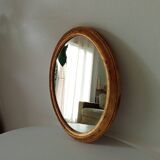 Antique oval mirror in gilded solid wood