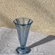 Blue molded glass vase in art deco relief