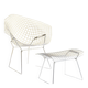 Vintage Diamond armchair with its ottoman.