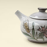 Théière motif végétal