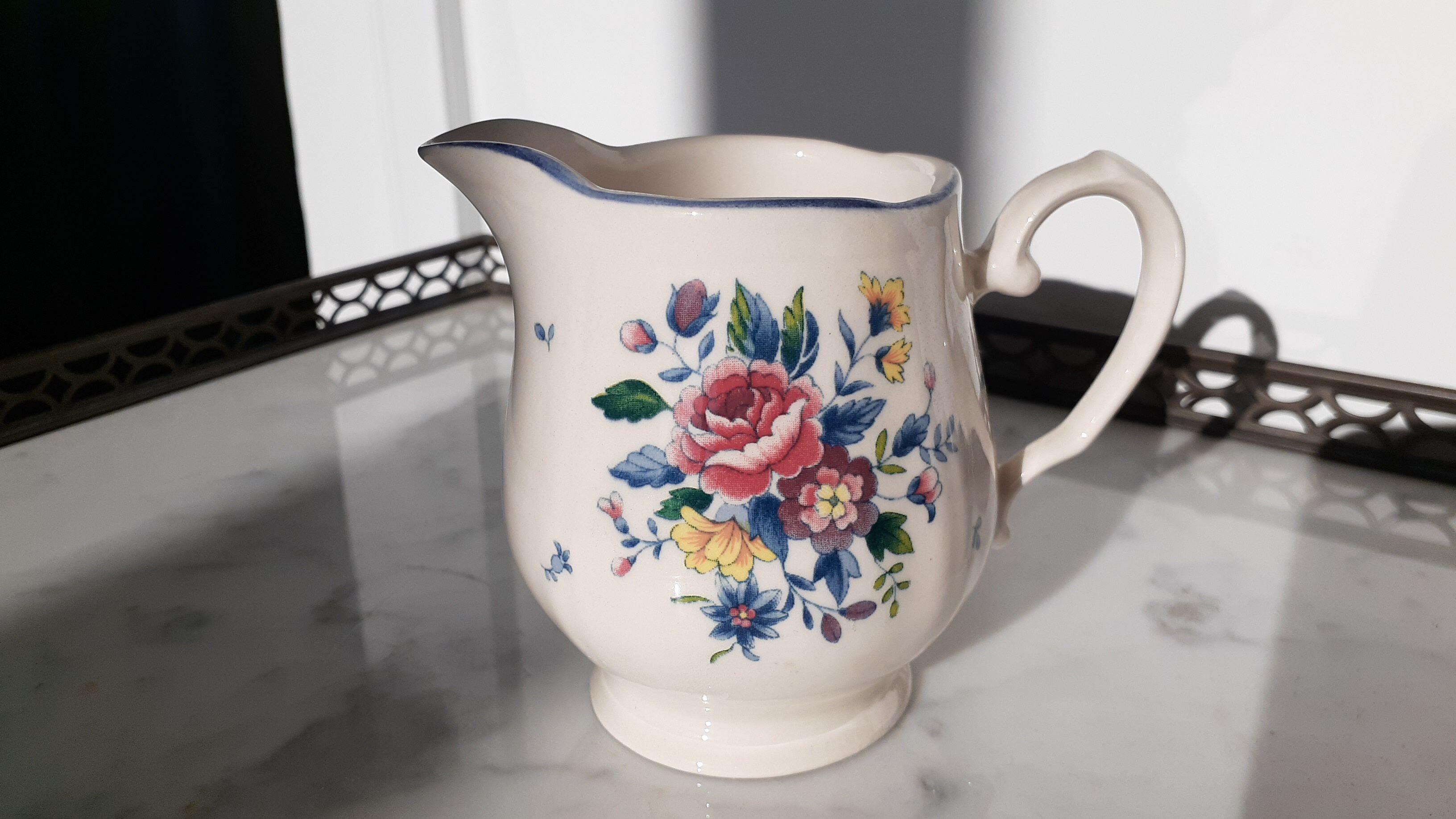Flowery milk jug