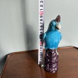 Porcelain parrot statuette