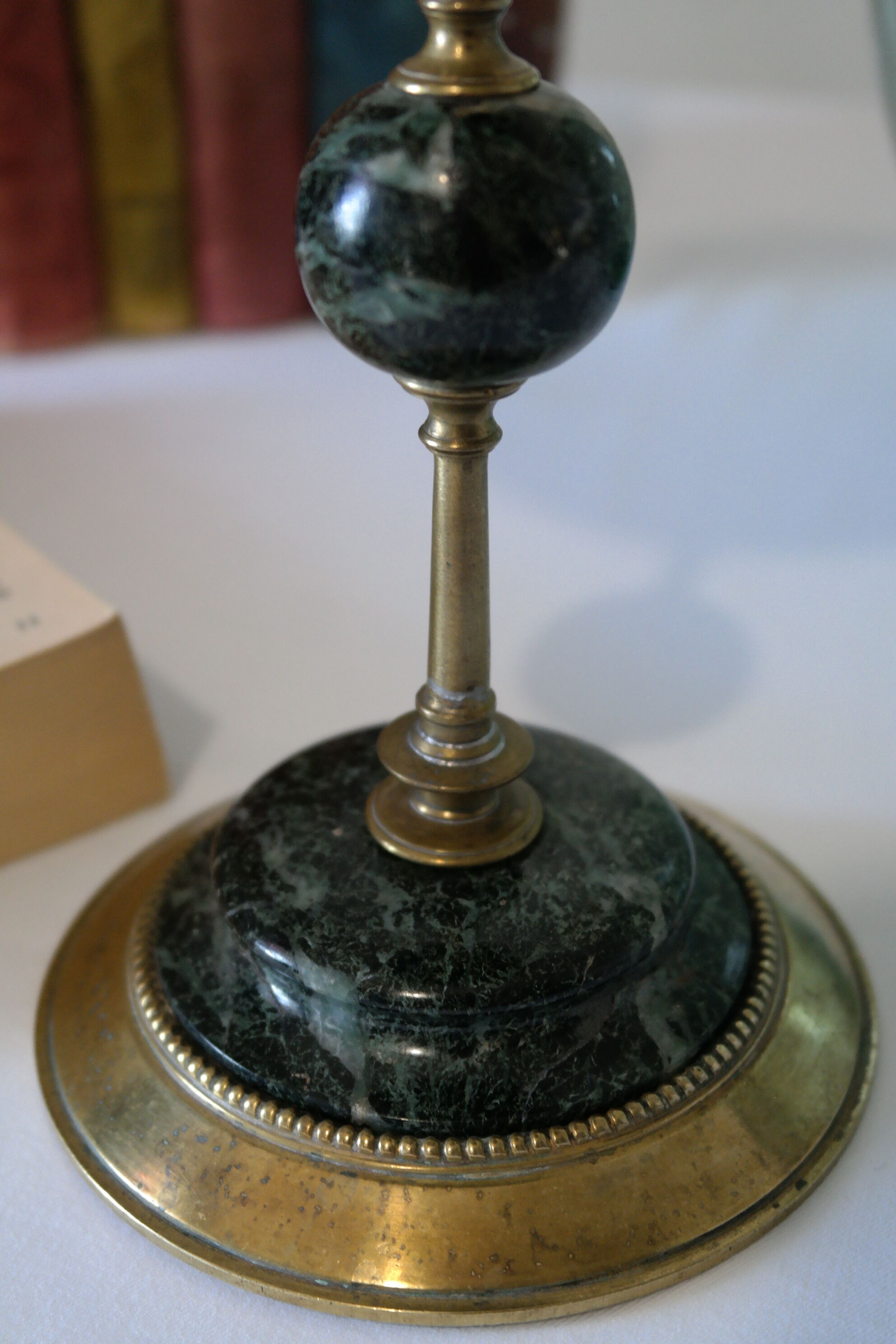 Brass and green marble candlestick