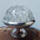 Glass flower arrangement from REIMS on a silver-plated metal stand.