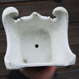 Ancient statuette of the virgin with the serpent in biscuit