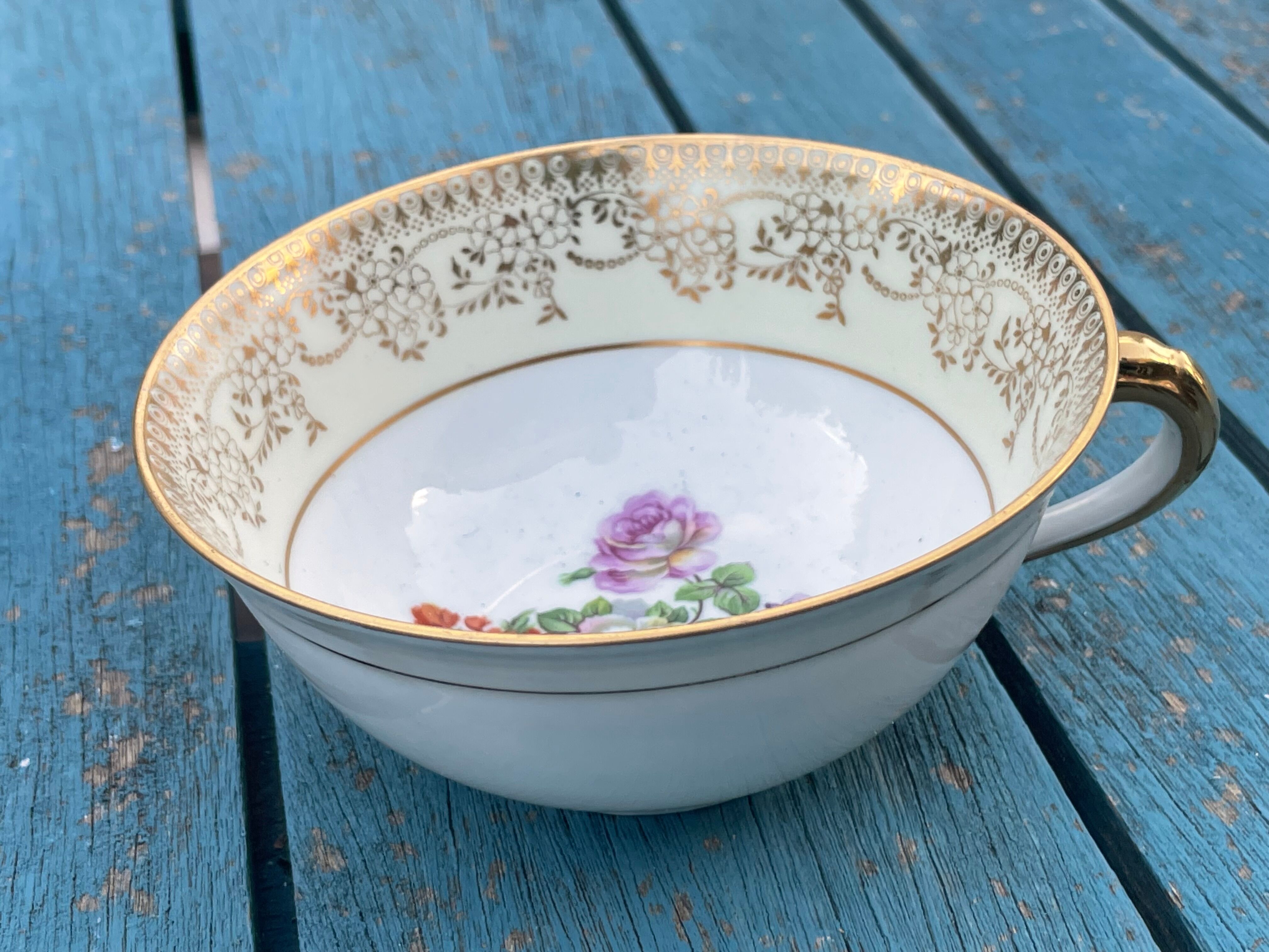 Limoges porcelain tea cup, signed