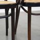 Set of 2 wooden dining chairs with woven seats