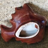 Ceramic fish pocket emptier