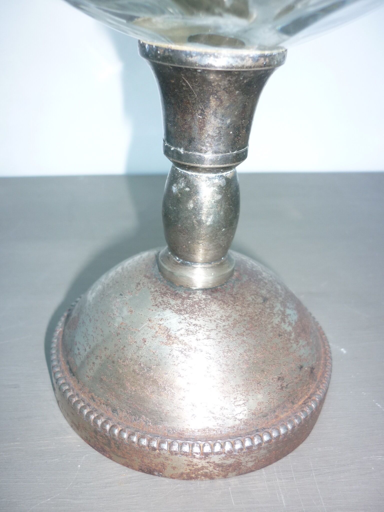 Vase or glass cup on silver stand