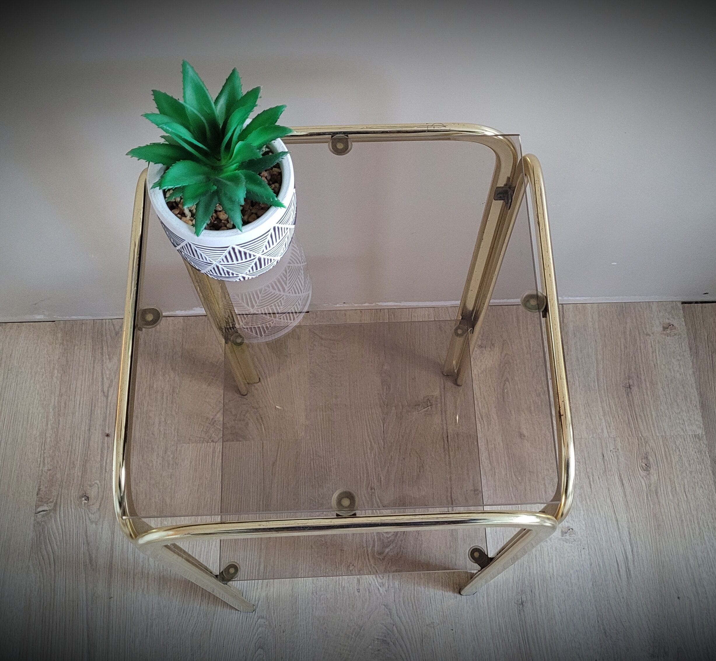Golden side table and smoked glass