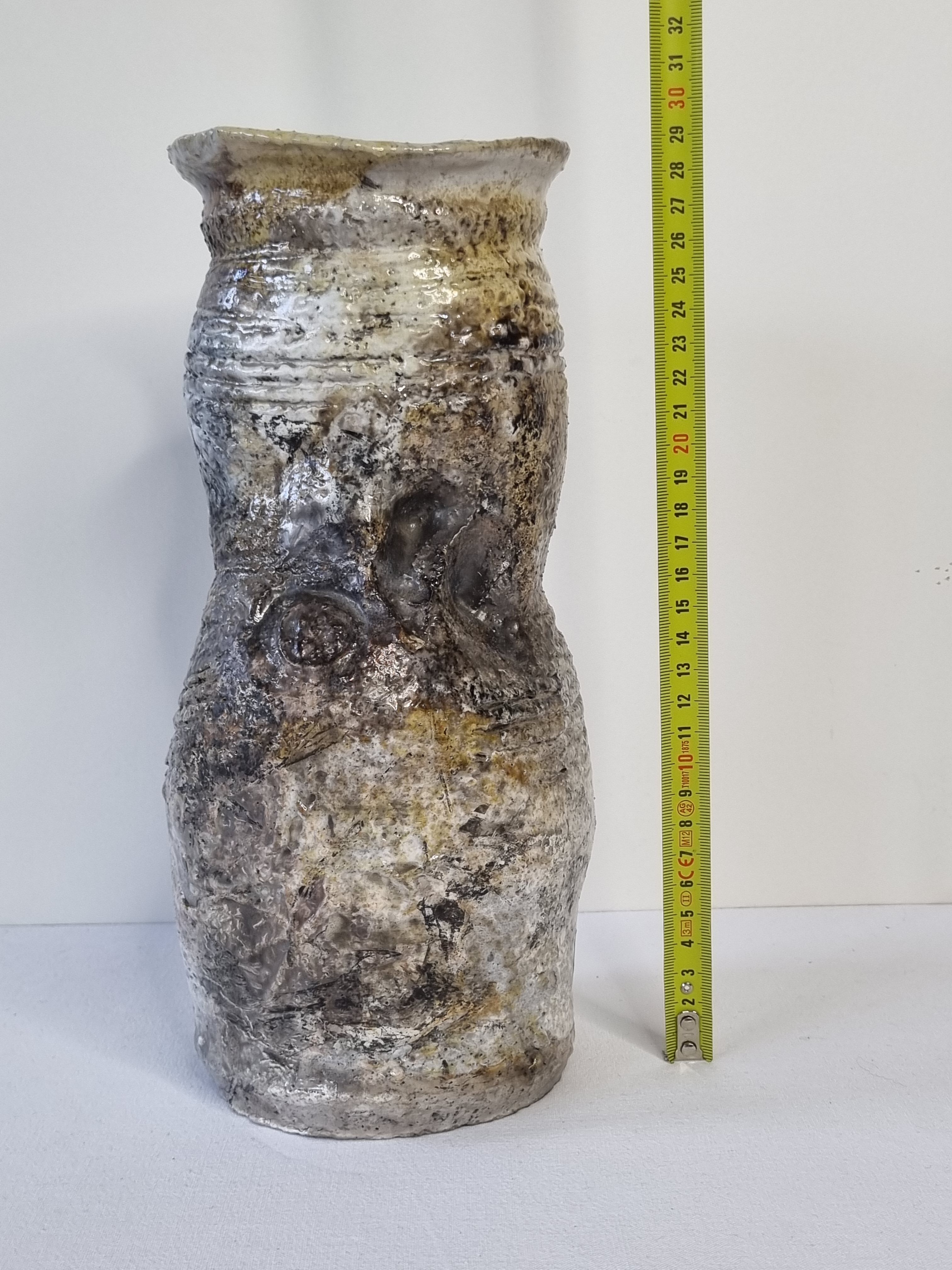 Enamelled ceramic roll vase