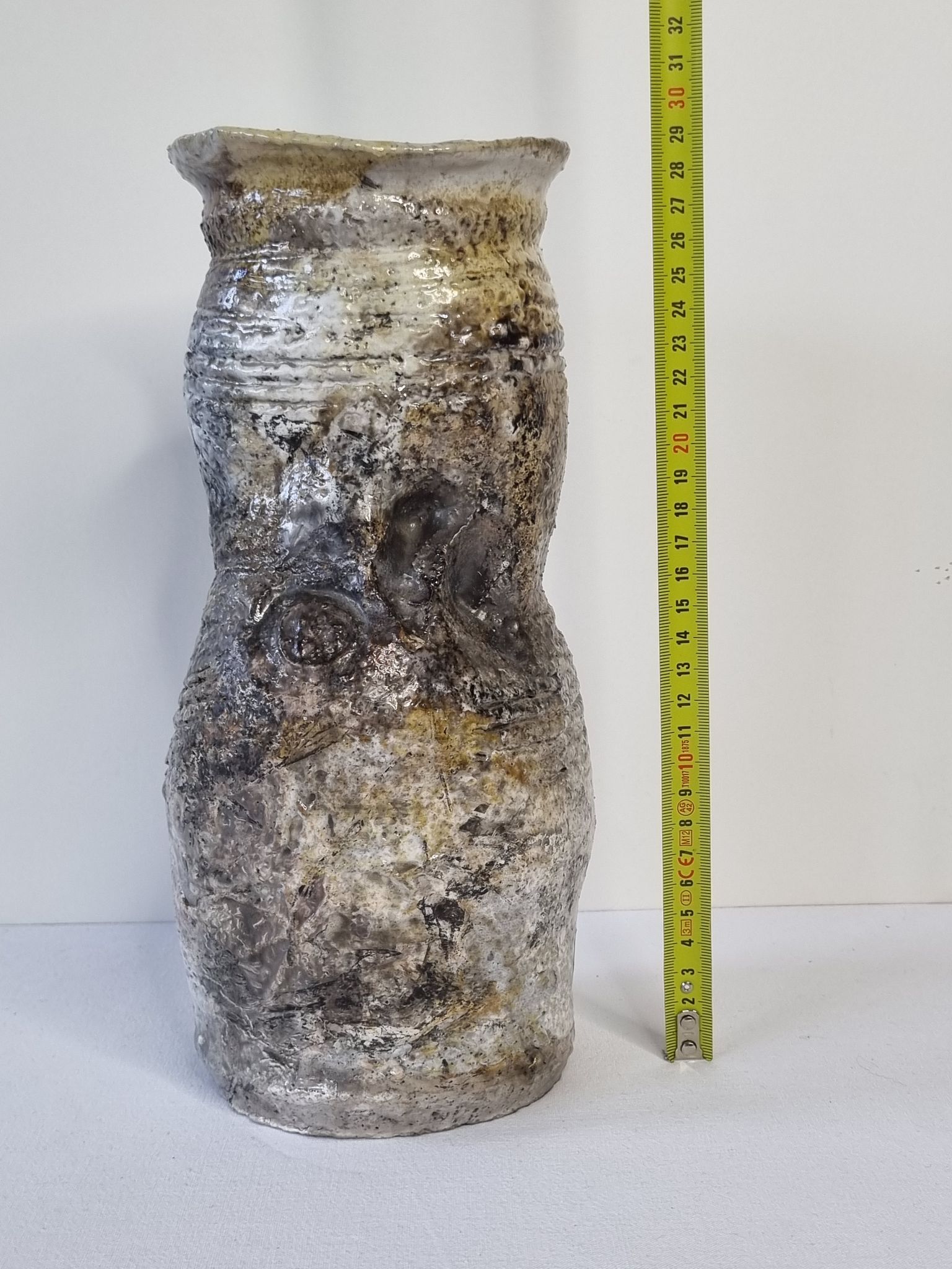 Enamelled ceramic roll vase