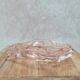 Vintage pink glass catchall / ashtray, hands joined.