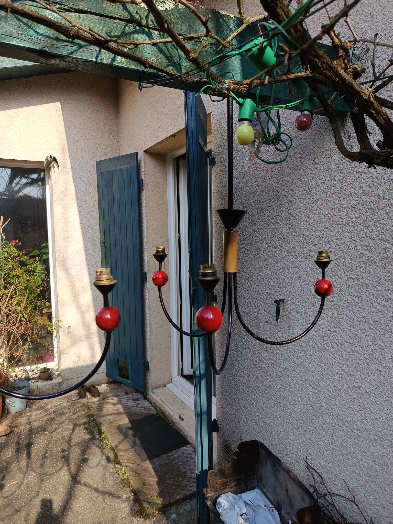 pair of vintage black metal chandeliers with red balls 1950/1970
