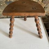 Low tripod stool with turned legs