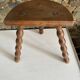 Low tripod stool with turned legs