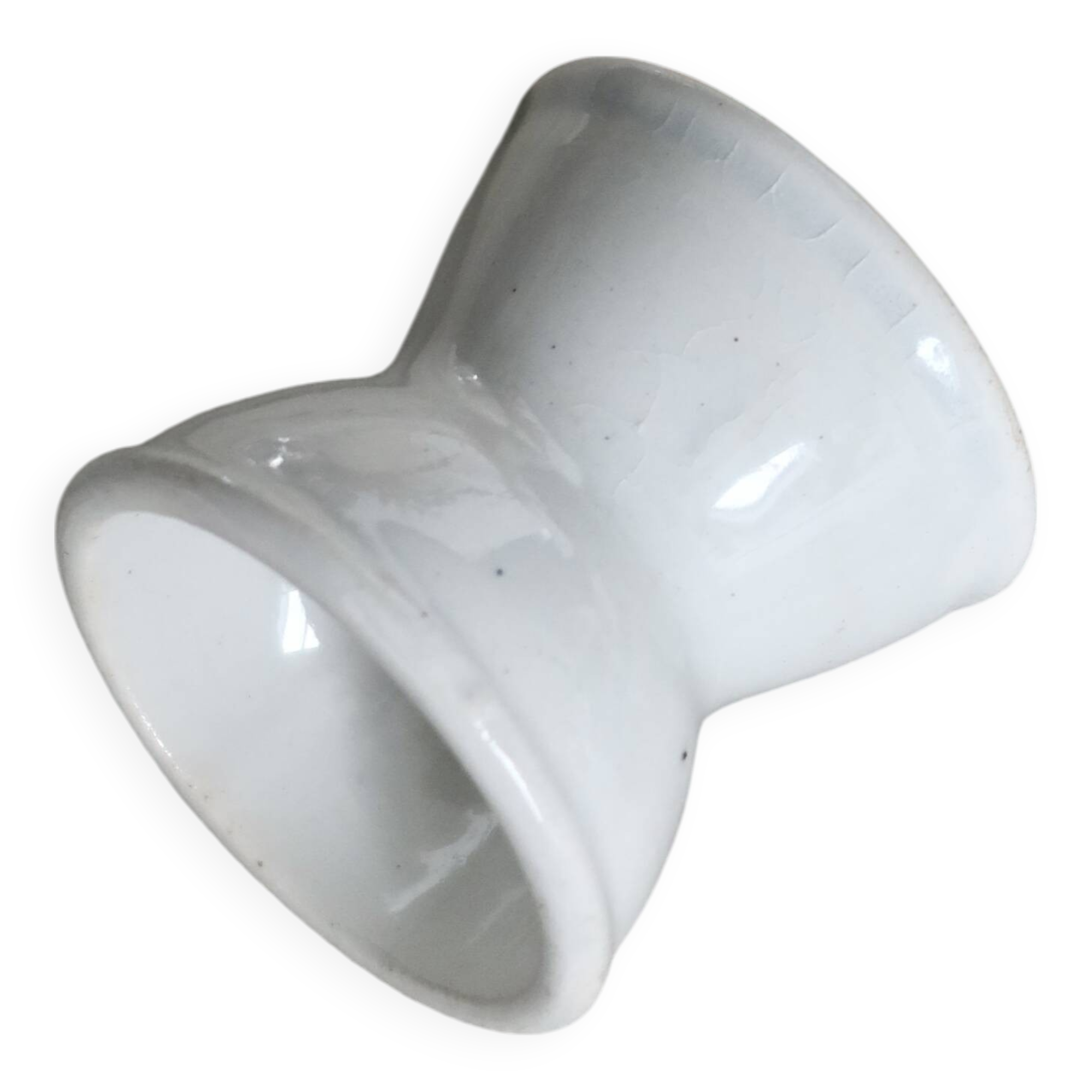 Antique diabolo egg cup in white earthenware