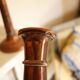 Pair of antique copper candlesticks