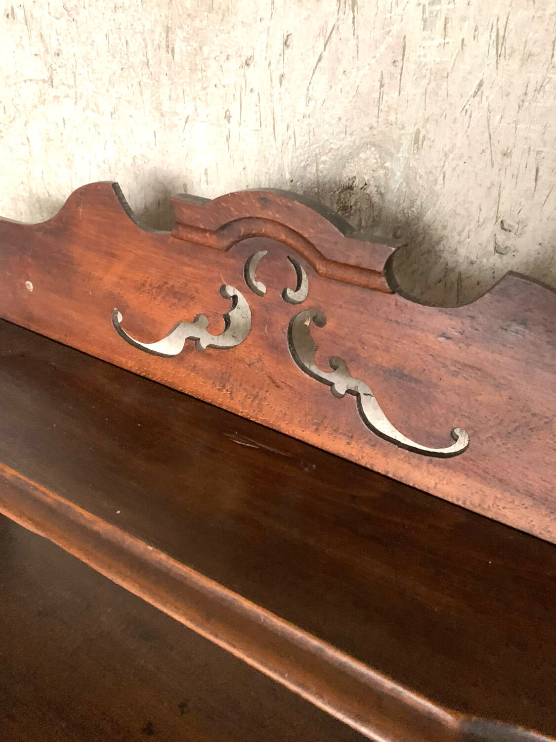 Carved wooden shelf