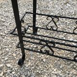 Wrought iron pot-carrying planter