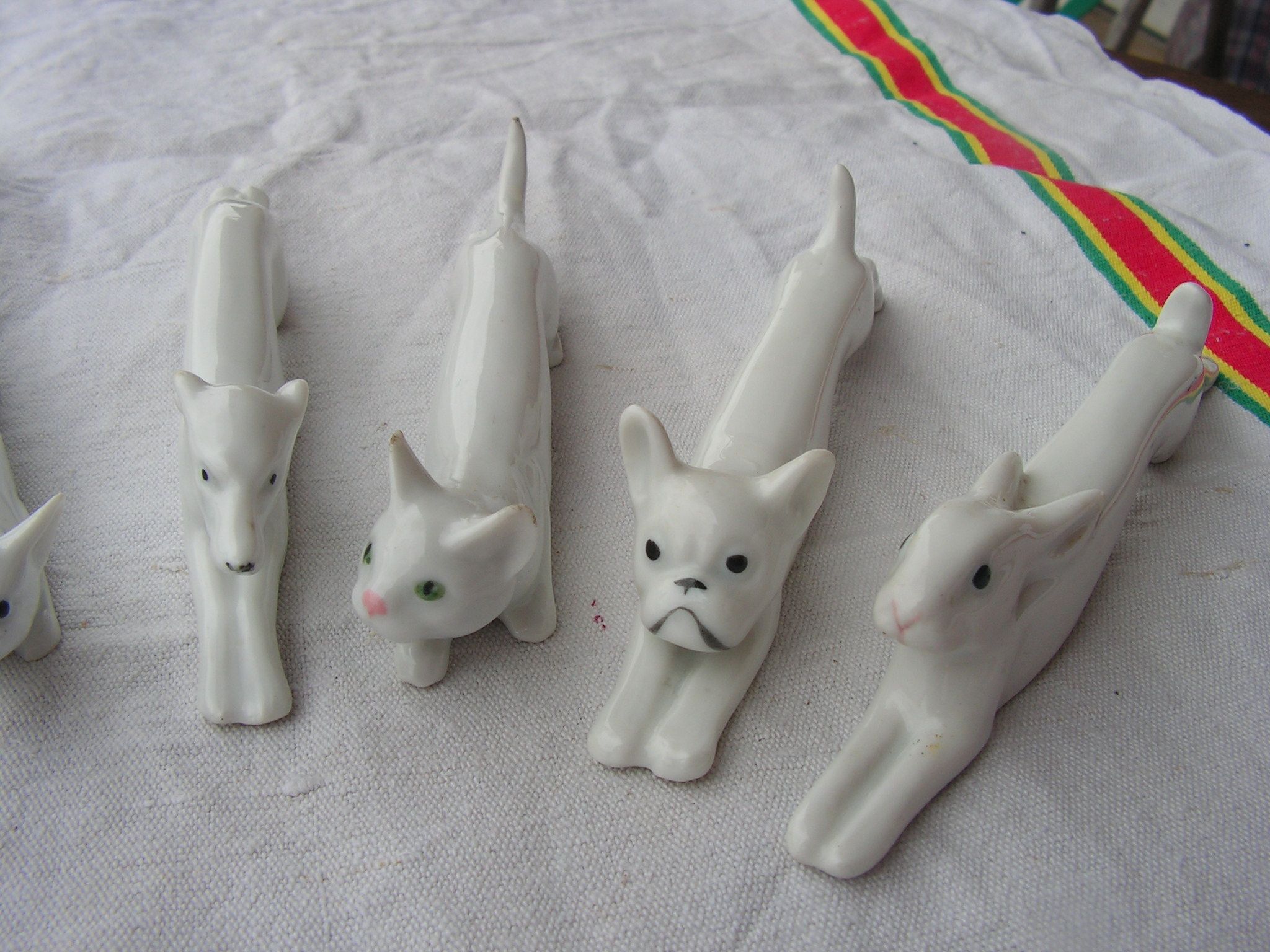 Set of expensive rests in faience in the shape of animal dog rabbit cat fox