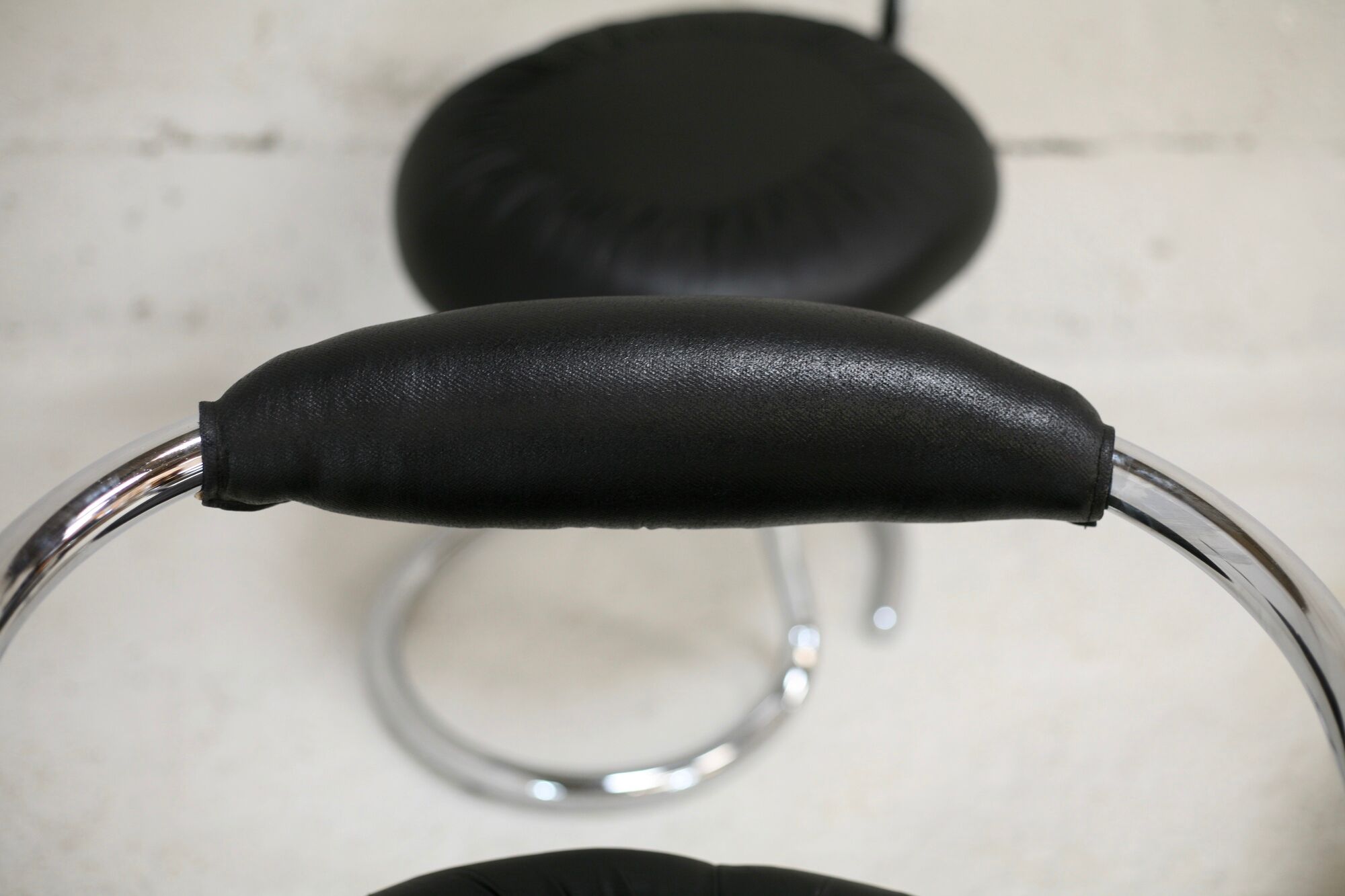 4 chairs tubular steel, imitation black leather, Italy, circa 1970