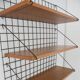 Meca wall shelf model by Pierre Guariche for Meurop, 1950s